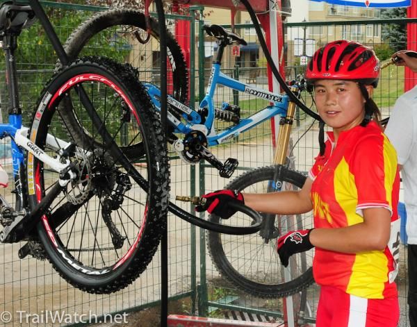 A Chinese rider is responsible for washing her own bike.