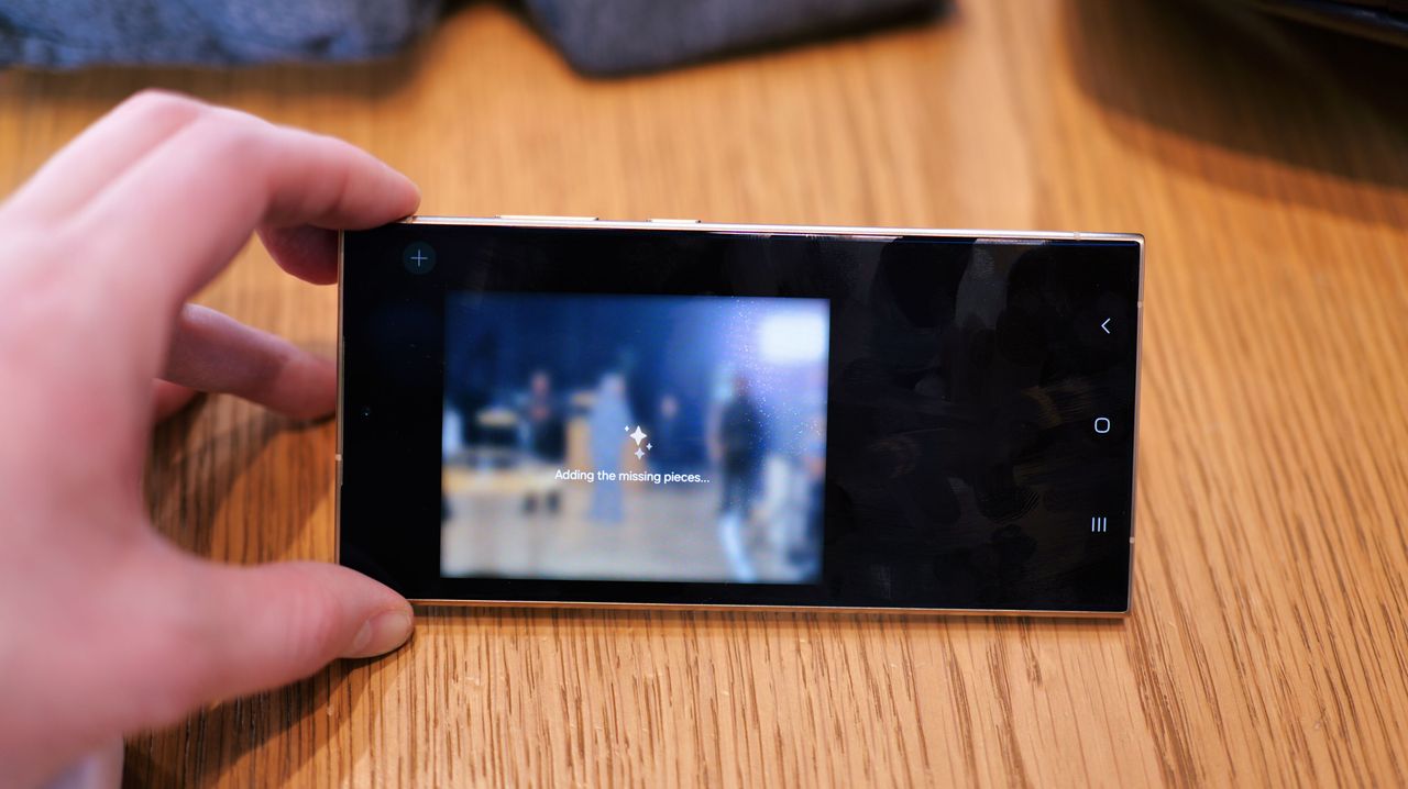 Samsung Galaxy S24 Ultra phone showing the camera app held in a hand