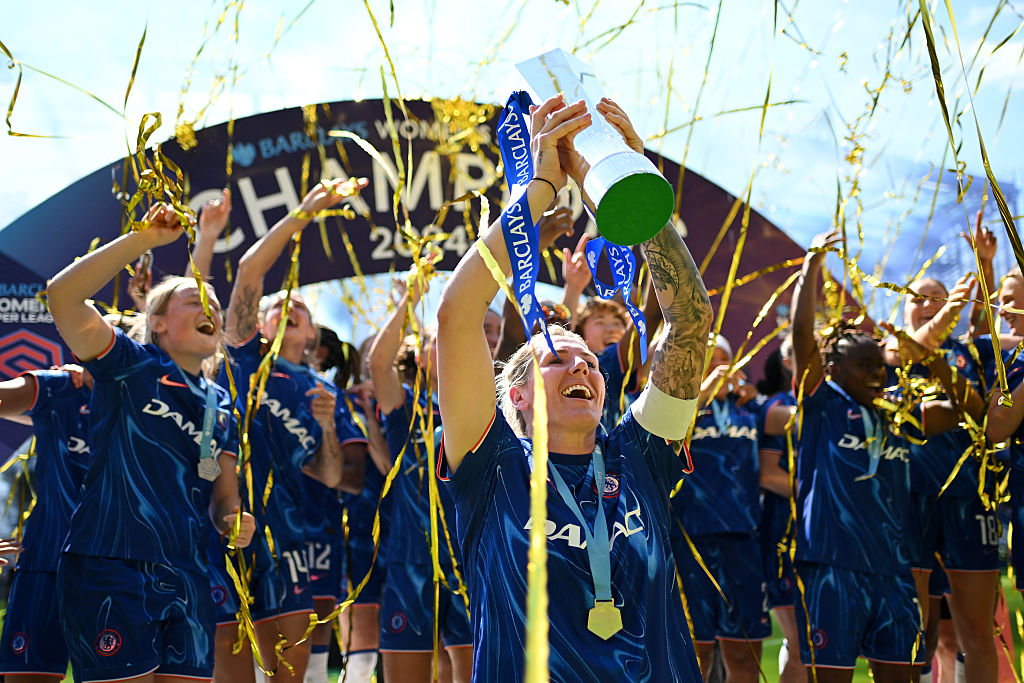 Millie Bright of Chelsea celebrates with the Barclays Women's Super League Trophy following the Barclays Women's Super League Match between Chelsea FC and Liverpool at Stamford Bridge on May 10, 2025 in London, England.