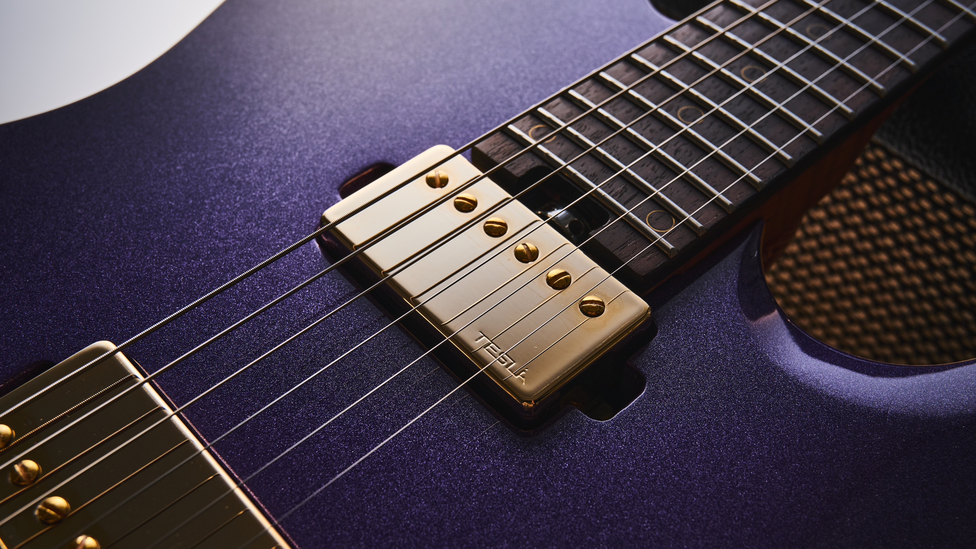 Harley Benton Fusion-T II HH RW HT in Purple Metallic finish with gold hardware. Shot on white surface.