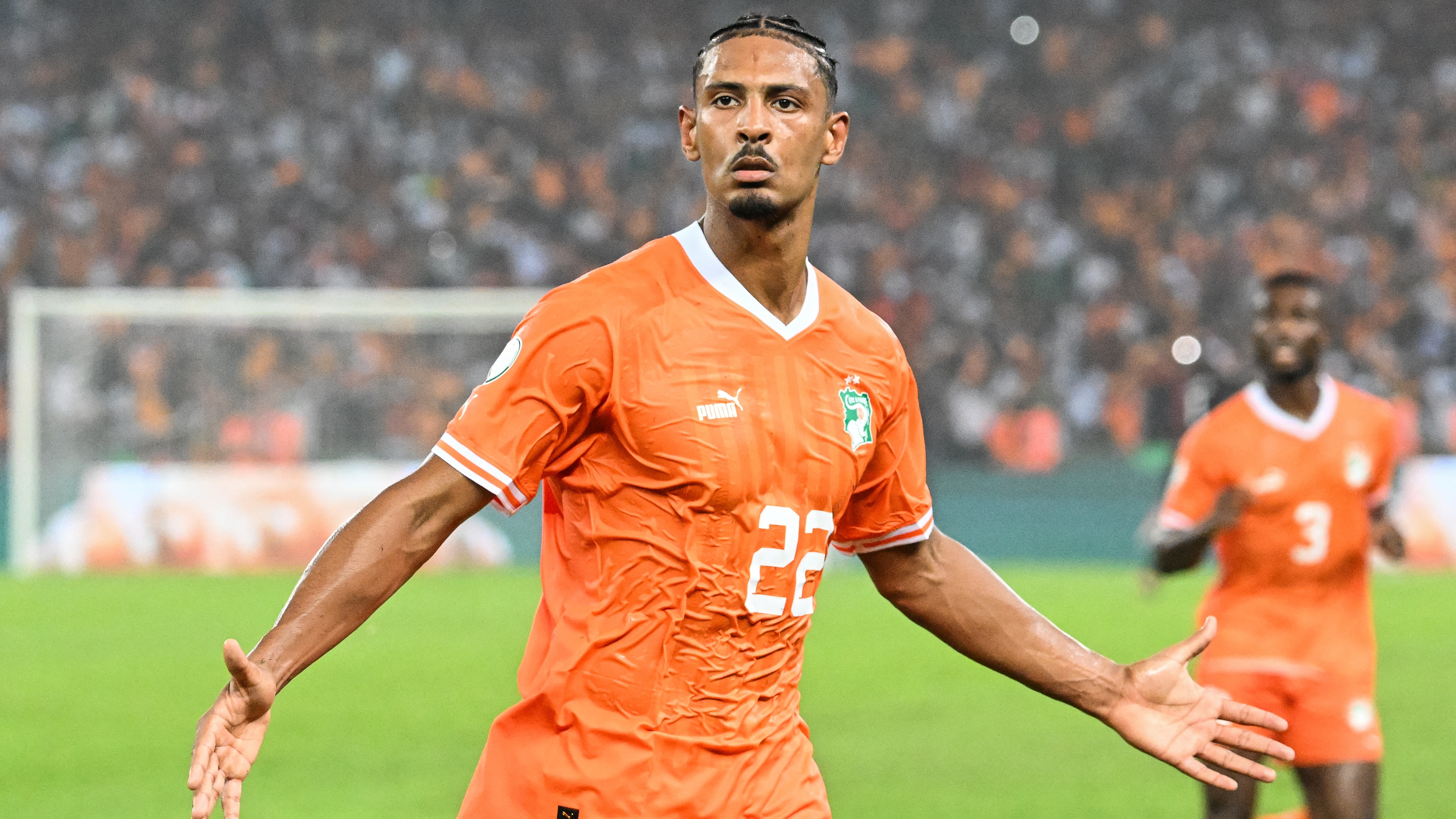 Sebastien Haller celebrates scoring his team's first goal during the Africa Cup of Nations (CAN) 2024 semi-final football match between Ivory Coast and Democratic Repuplic of Congo at Alassane Ouattara Olympic Stadium in Ebimpe, Abidjan on February 7, 2024. 