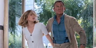 No Time To Die Lea Seydoux and Daniel Craig storm into a building