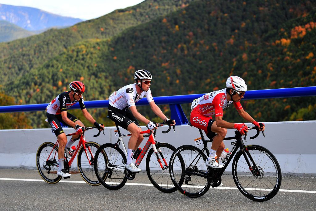 SABIANIGO SPAIN OCTOBER 24 Guillaume Martin of France and Team Cofidis Solutions Credits Thymen Arensman of The Netherlands and Team Sunweb Tim Wellens of Belgium and Team Lotto Soudal Breakaway during the 75th Tour of Spain 2020 Stage 5 a 1844km Huesca to Sabinigo 835m lavuelta LaVuelta20 La Vuelta on October 24 2020 in Sabinigo Spain Photo by Justin SetterfieldGetty Images