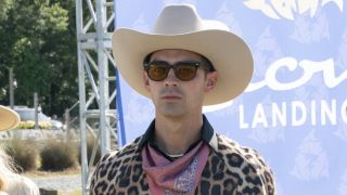 Joe Jonas in cowboy hat and leopard print on The Righteous Gemstones