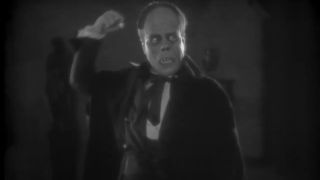 Lon Chaney with his fist raised in The Phantom of the Opera