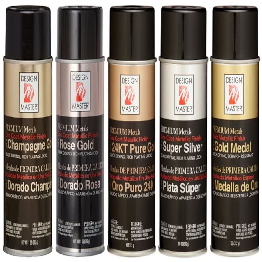 Cans of metallic spray paint