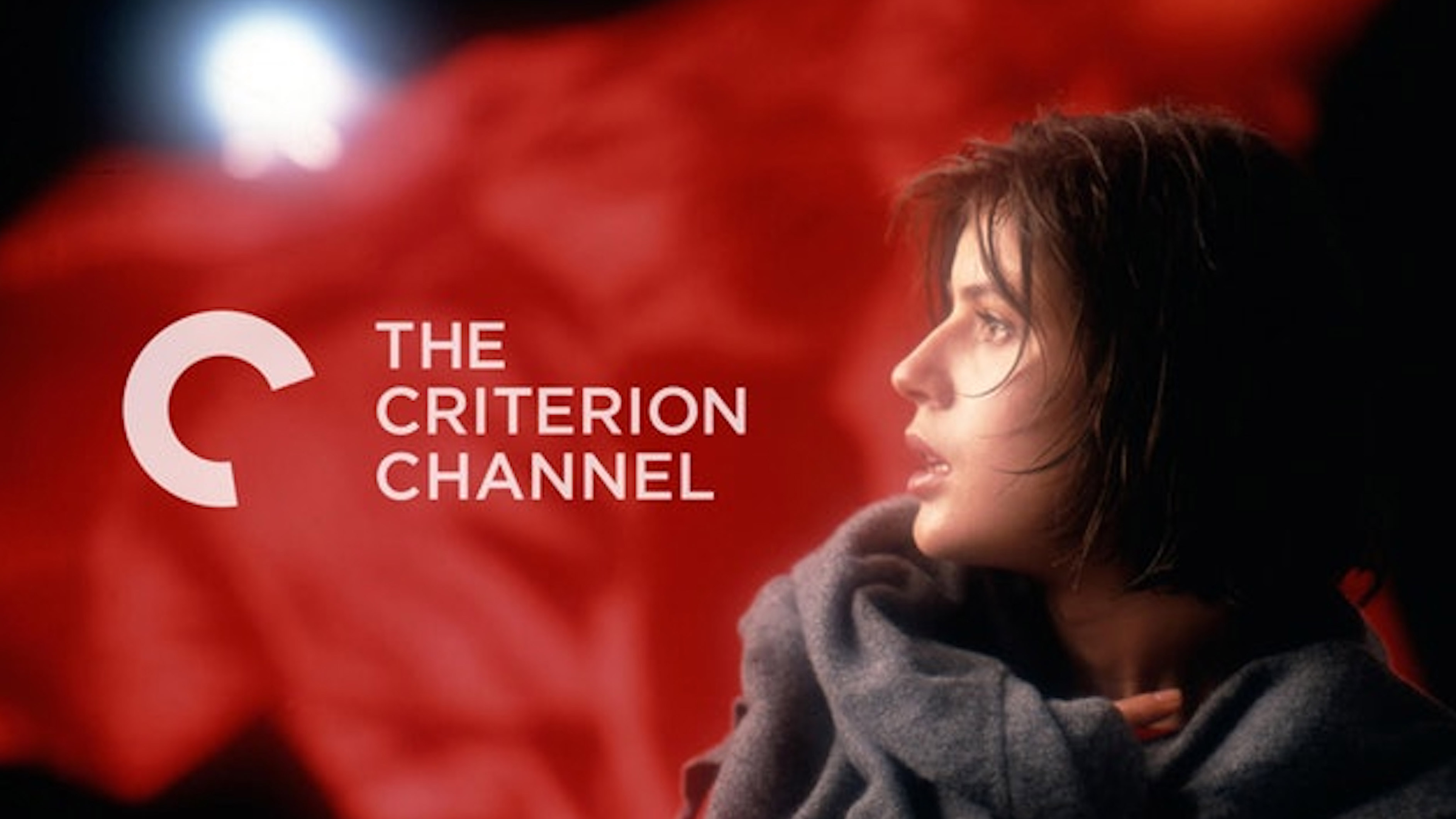 Irene Jacob against red background