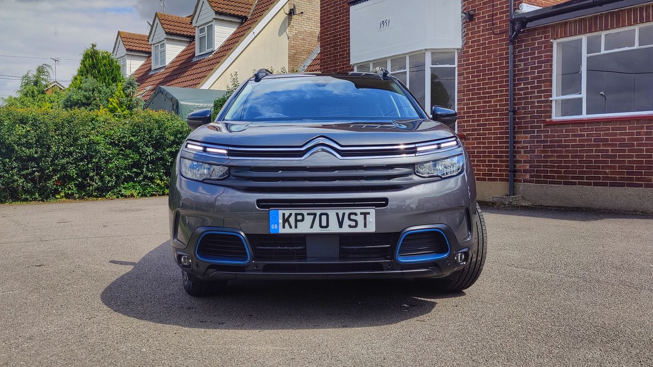 Close up of front of the Citro&euml;n C5 AirCross outside a house