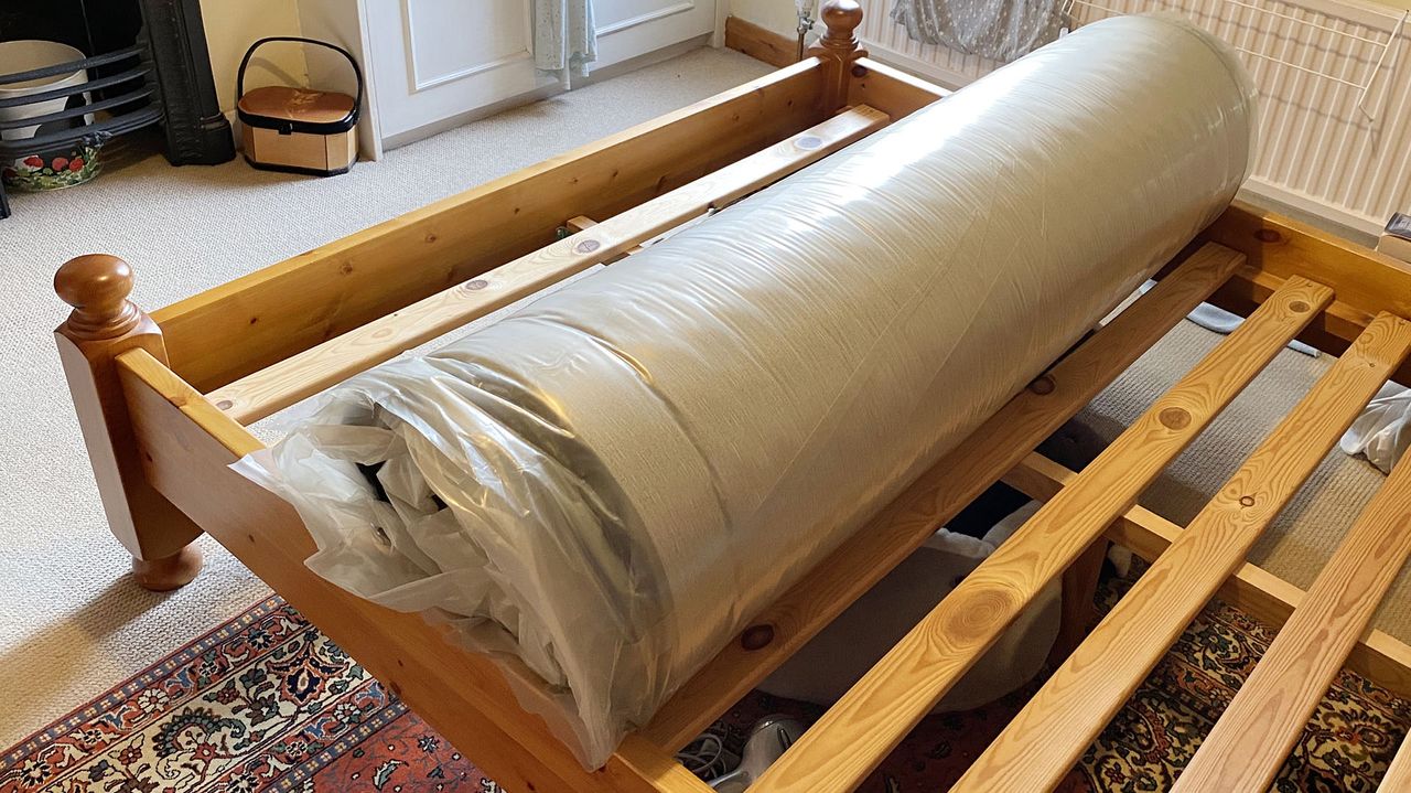 Nectar Premier Hybrid mattress vacuum packed and rolled
