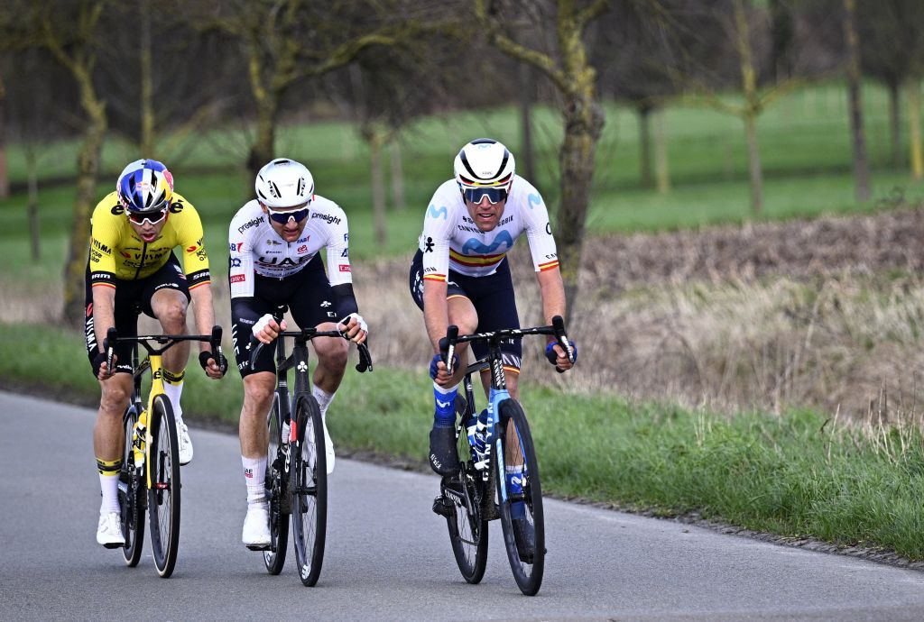 Belgian Wout van Aert of Team Visma-Lease a Bike, Belgian Tim Wellens of UAE Team Emirates and Spanish Oier Lazkano of Movistar Team pictured in action during the Kuurne-Brussels-Kuurne one day cycling race, 196,4 km from Kuurne to Kuurne via Brussels, Sunday 25 February 2024. BELGA PHOTO JASPER JACOBS (Photo by JASPER JACOBS / BELGA MAG / Belga via AFP)