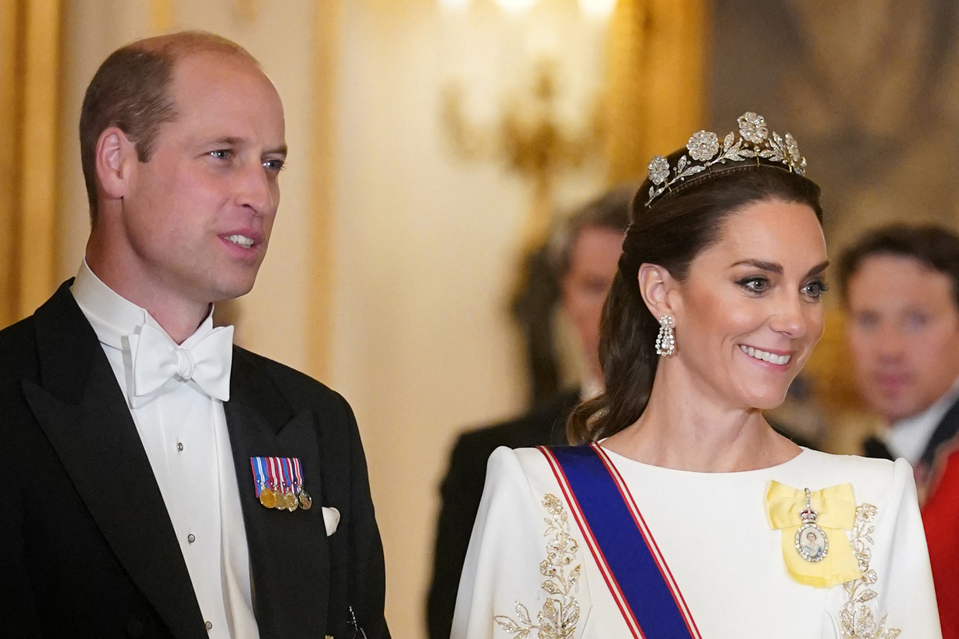 Prince William, Prince of Wales (L) and Catherine, Princess of Wales arrive for a a State Banquet at Buckingham Palace in central London on November 21, 2023