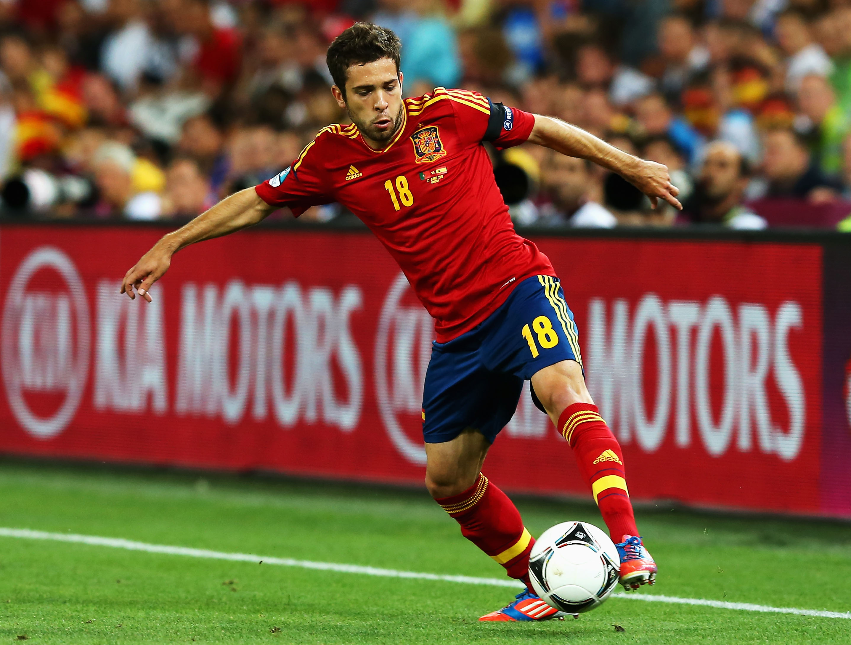 Jordi Alba on the ball for Spain against Portugal at Euro 2012.