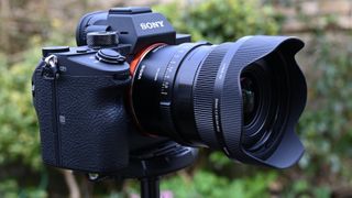 Sigma 20mm F2 DG DN | C lens mounted to Sony A7 camera, on tripod