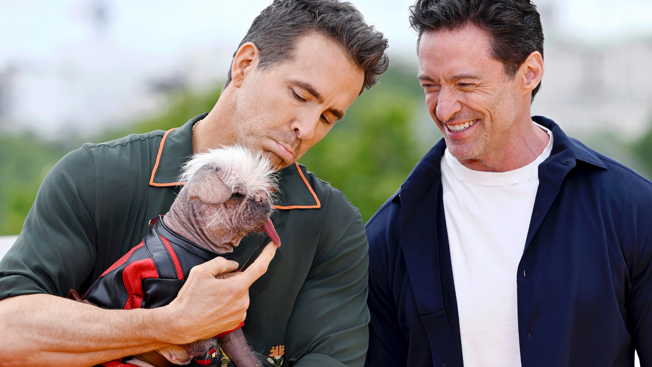 Ryan Reynolds, Peggy aka Dogpool the “UK’s Ugliest Dog Winner” and Hugh Jackman attend the photocall for &quot;Deadpool &amp; Wolverine&quot; at the IET Building, Savoy Place on July 12, 2024 in London, England