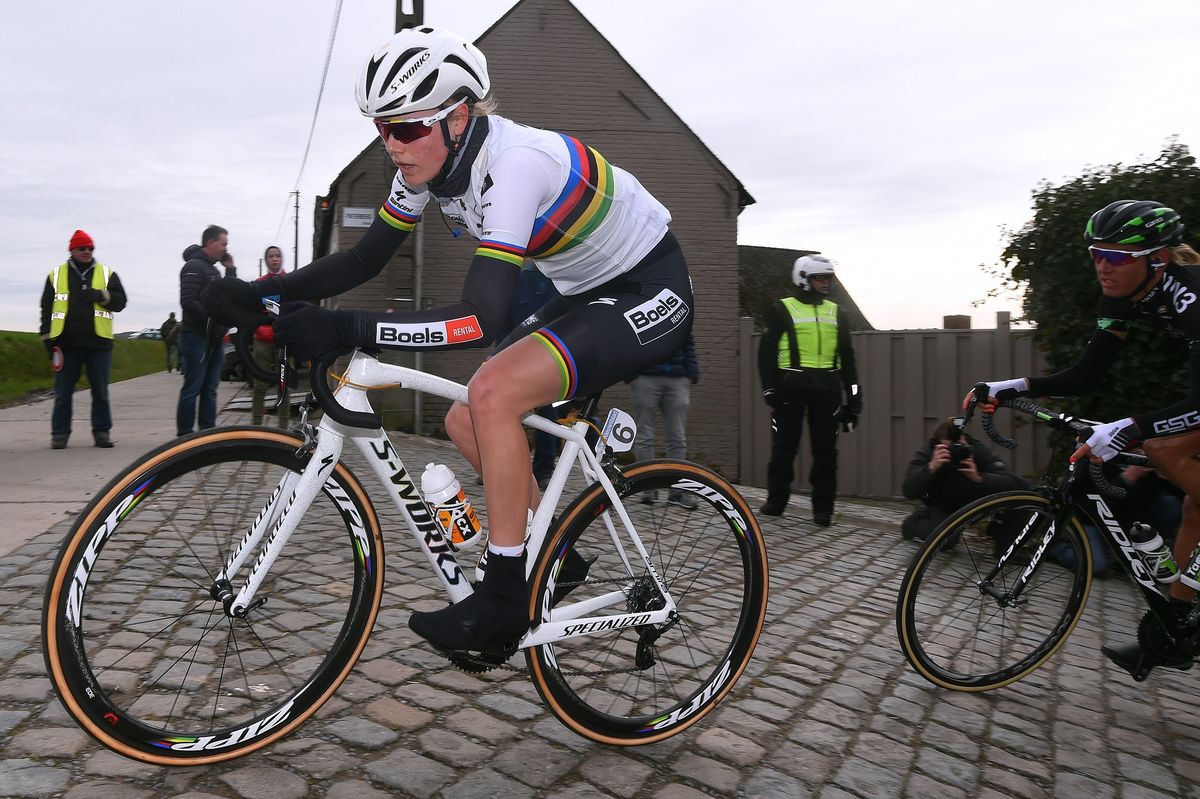 Amalie Dideriksen racing at Omloop on a white Specialized