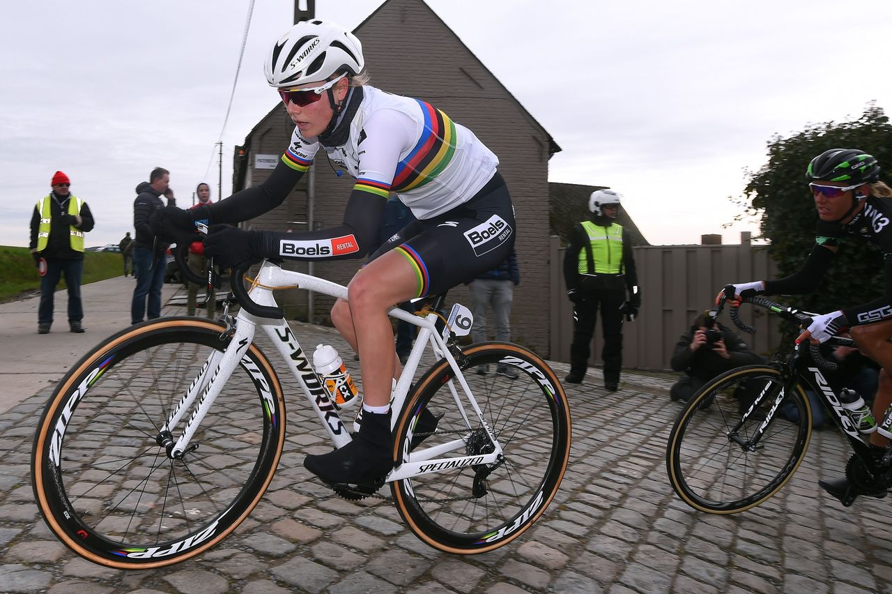 Amalie Dideriksen racing at Omloop on a white Specialized