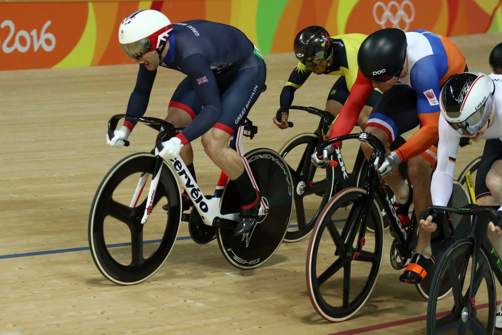 Jason Kenny edges ahead in the sprint to win the keirin and his sixth gold medal