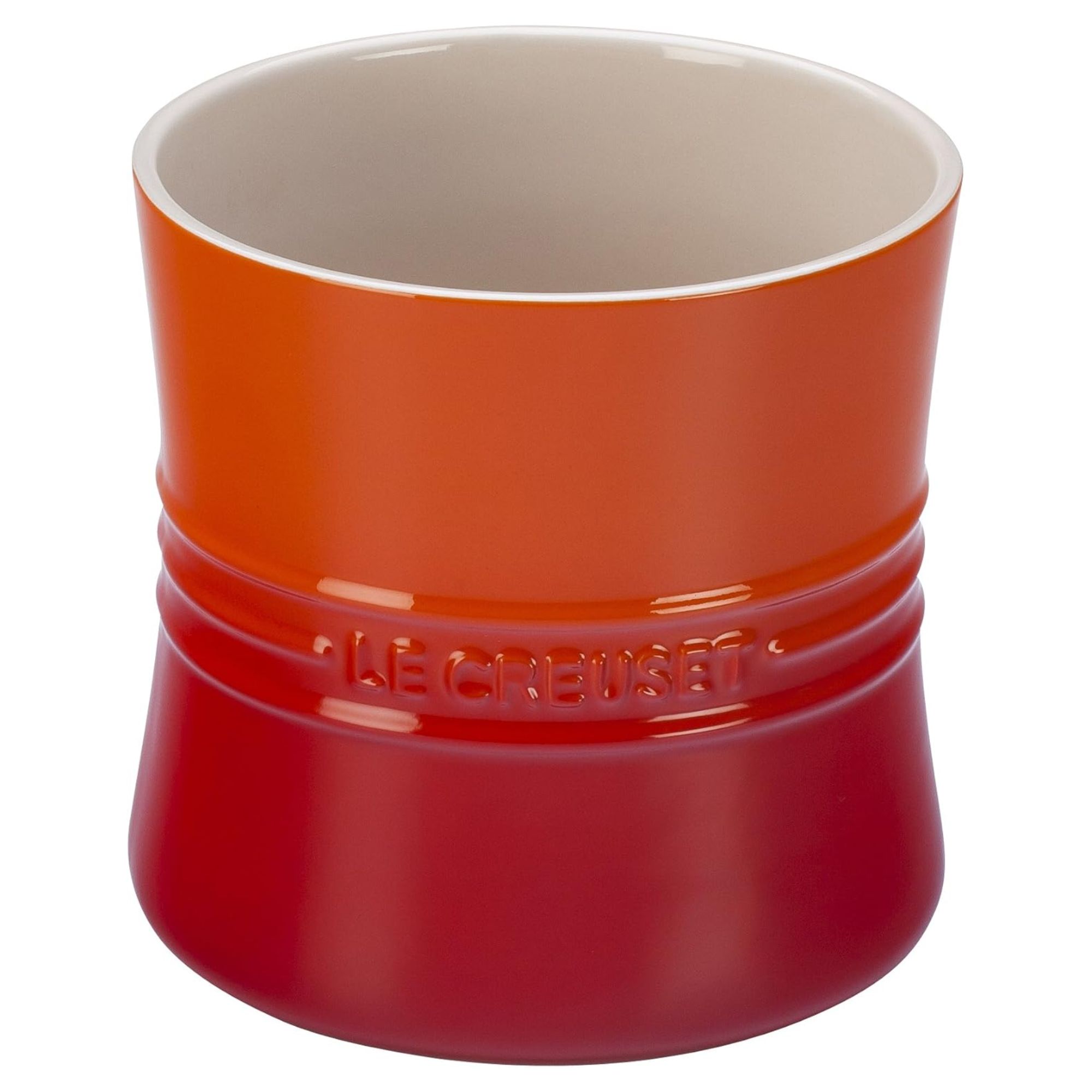 Orange ceramic Le Creuset utensil holder
