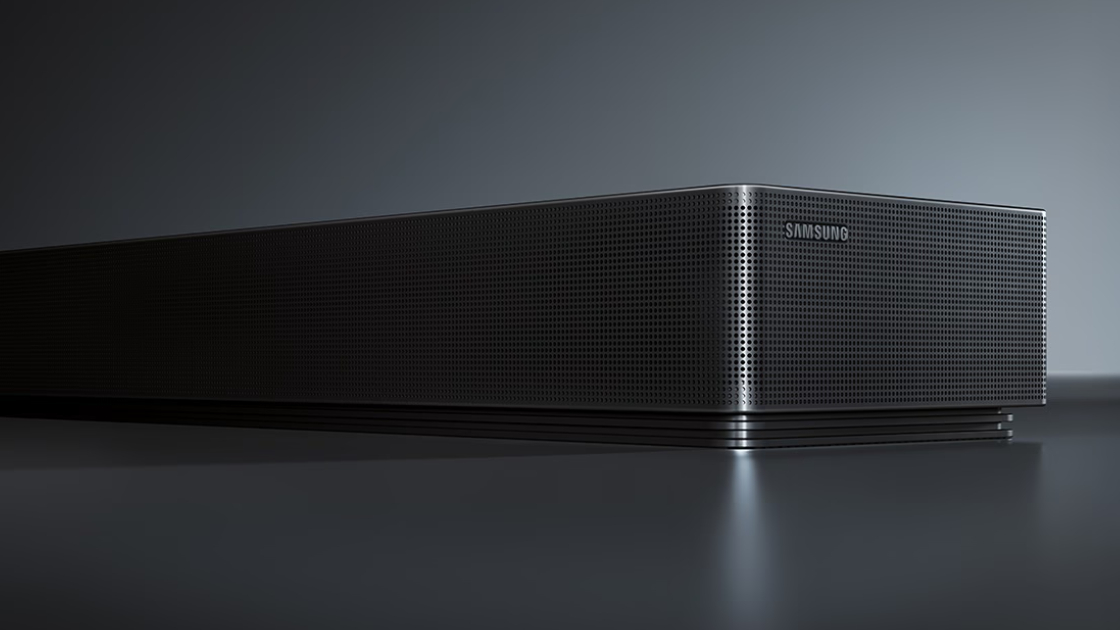 The Samsung HW-QS90H Soundbar on a black gradient background.