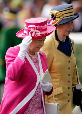 The late Queen Elizabeth with Princess Anne