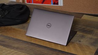 A Dell XPS 13 (2022) on a wooden table