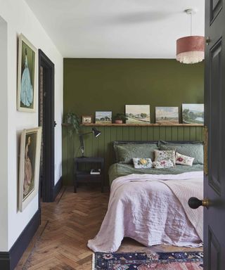 green bedroom with wooden shelf