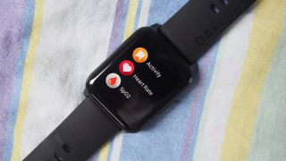 Activity, heart rate, and SpO2 app icons on the Realme Watch 2