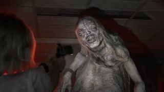 Grace holding a gun up at The Girl in Resident Evil Requiem