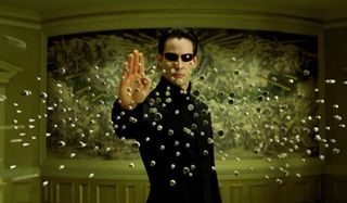 The Matrix Reloaded Neo stops the oncoming bullets midair