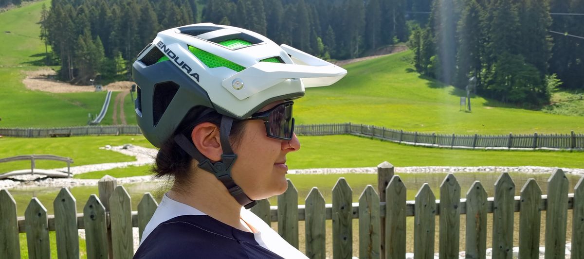 A side view of Mildred Locke wearing the Endura MT500 Mips helmet