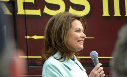 Rep. Michele Bachmann (R-Minn.) speaks to fans during the Tea Party Express tour last April.