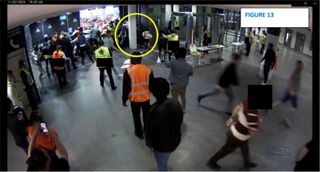 An image taken moments later shows the same man holding a young child, with a slightly older child in a white England shirt to his right. Eric Stuart said the man was trying to rescue a third child who was embedded in the crowd
