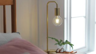 Habitat Rayner Table Lamp on a bedside table