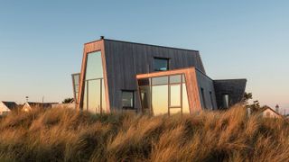 angular contemporary home with timber cladding