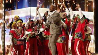 How many Golden Buzzers are allowed on AGT? Pictured: Terry Crews with Chioma and The Atlanta Drum Academy