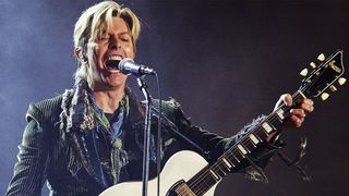 David Bowie performs on stage on the third and final day of "The Nokia Isle of Wight Festival 2004" at Seaclose Park, on June 13, 2004 in Newport, UK. The third annual rock festival takes place during the Isle of Wight Festival which runs from June 4-19.