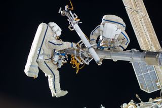 Expedition 30 Astronauts During Spacewalk