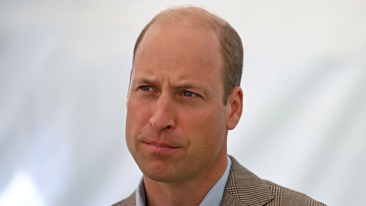 Prince William could be &quot;kicking himself&quot;, according to a royal expert. Seen here he talks with workers from across the construction industry