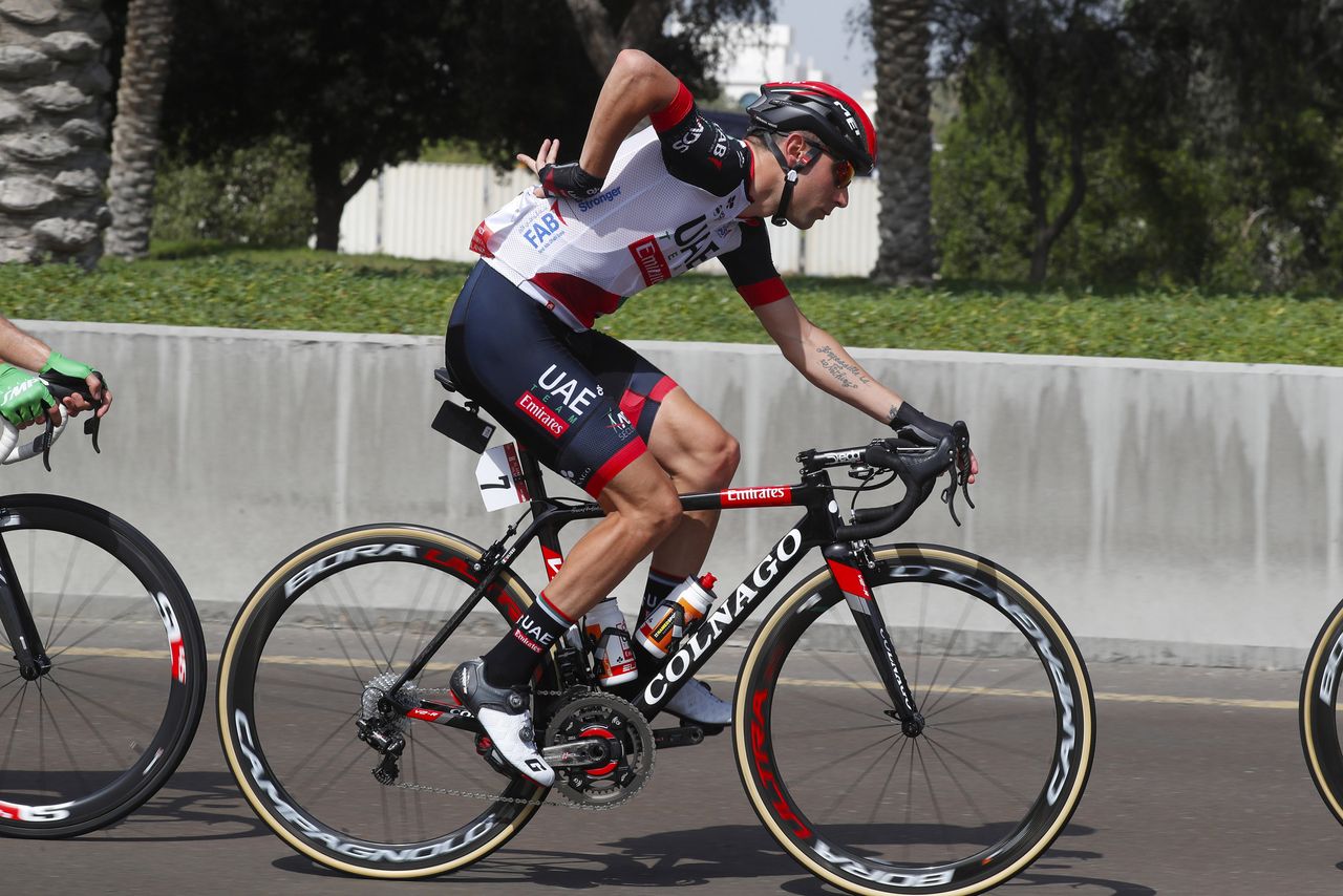 Diego Ulissi gets something out of his pocket