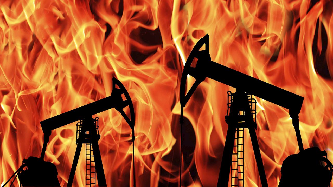 oil pumps on the background of flames