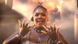 Lizzo in her music video for Rumors