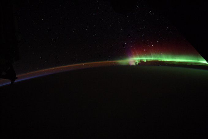 green aurora over earth