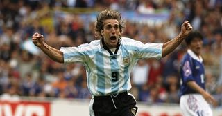 Gabriel Batistuta of Argentina celebrates after scoring in the World Cup group H game against Japan at the Stade Municipal in Toulouse, France. Argentina won 1-0.