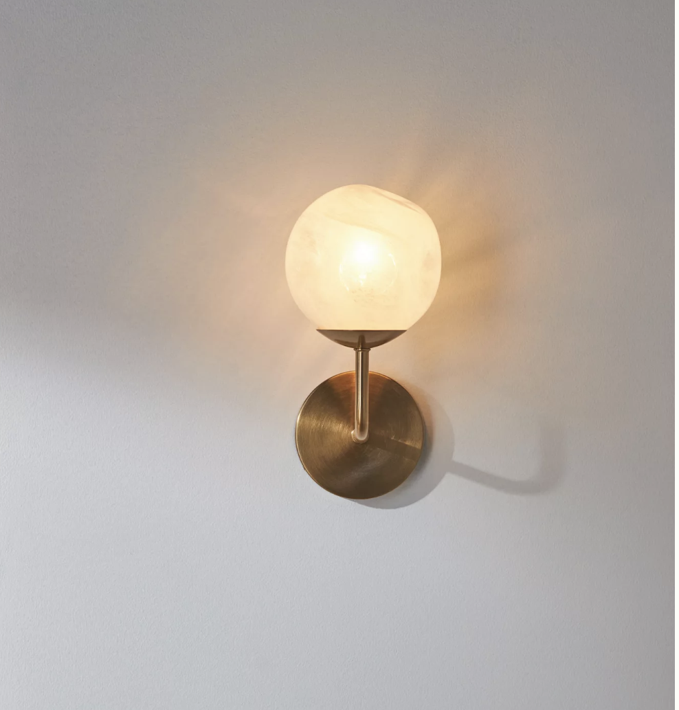 glass globe wall lamp with brass fixture