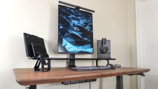 An angled view of the distraction-free desk setup I built around the Oakywood Standing Desk Pro