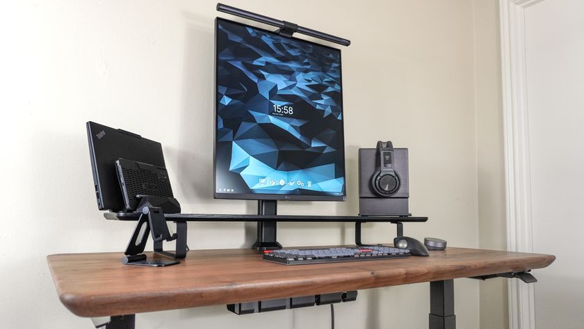 An angled view of the distraction-free desk setup I built around the Oakywood Standing Desk Pro