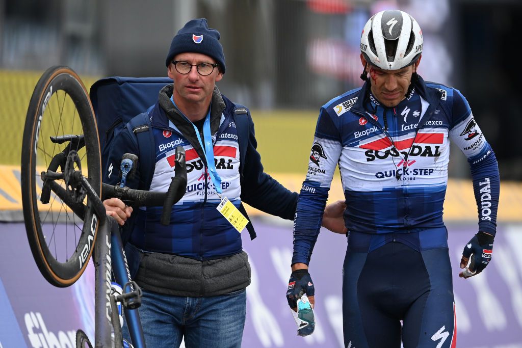OUDENAARDE BELGIUM APRIL 02 Davide Ballerini of Italy and Team Soudal QuickStep crosses the finish line injured after being involved in a crash during the 107th Ronde van Vlaanderen Tour des Flandres 2023 Mens Elite a 2734km one day race from Brugge to Oudenaarde UCIWT on April 02 2023 in Brugge Belgium Photo by Tim de WaeleGetty Images