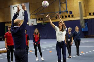 Kate Middleton plays netball