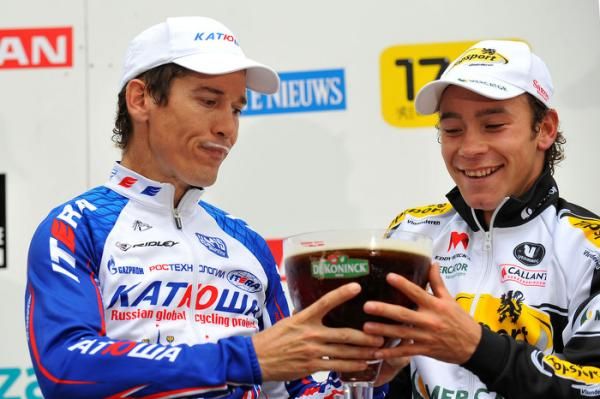 robbie McEwen gets a drink but would have preferred the win