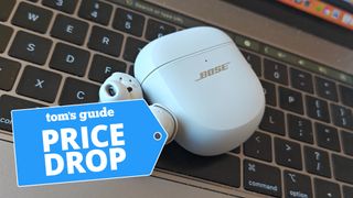 Bose QuietComfort Ultra Earbuds on MacBook keyboard